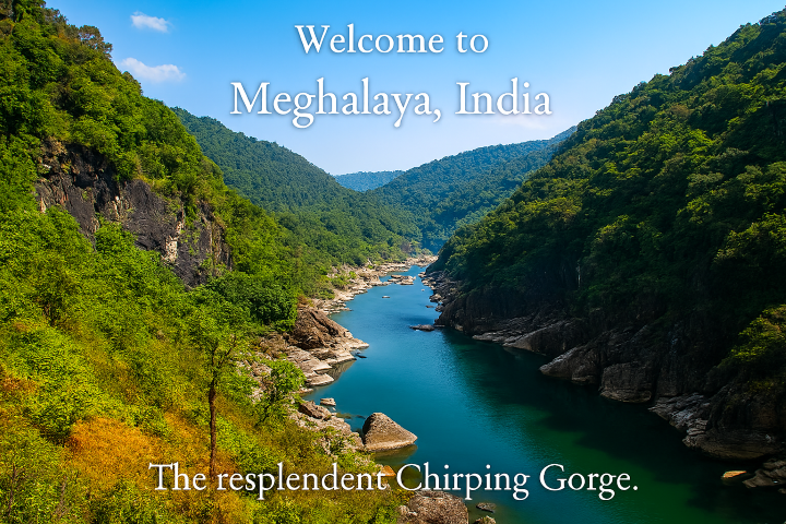 Chirping Gorge, Meghalaya Lush-gorge-in-Meghalaya,-India,-with-a-turquoise-river-winding-through-steep,-green-cliffs-under-a-clear-blue-sky
