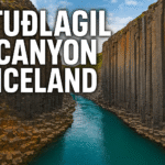 Stuðlagil Canyon Iceland feature image — turquoise river and basalt cliffs